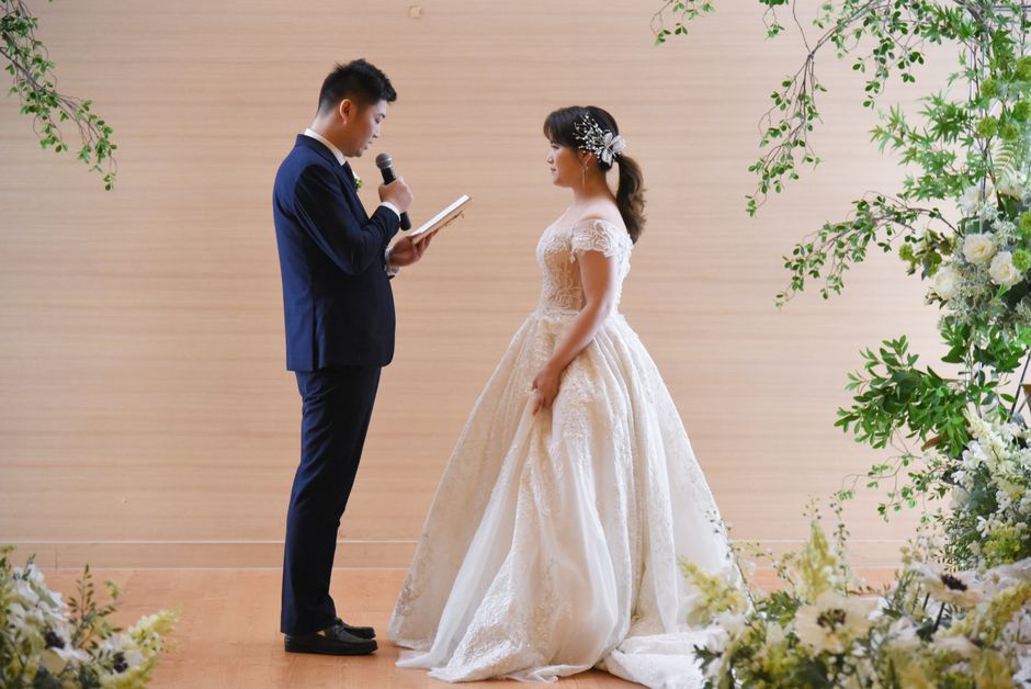 Emotional wedding vows being recorded